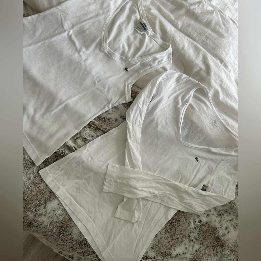 Two white Lacoste tops